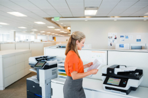 Woman in an office using an HP ScanJet