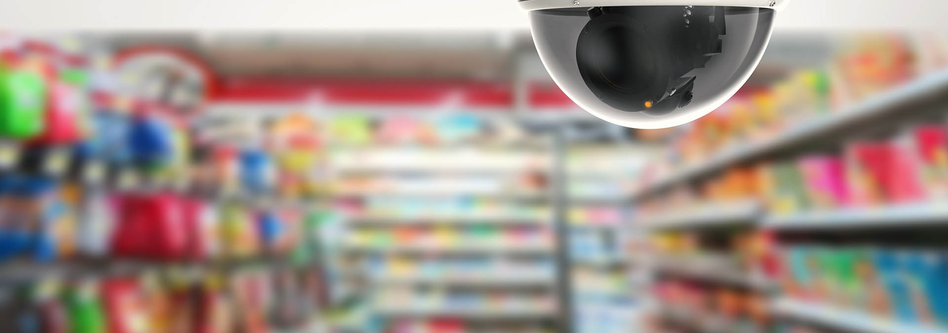Photo of surveillance camera in a grocery store.